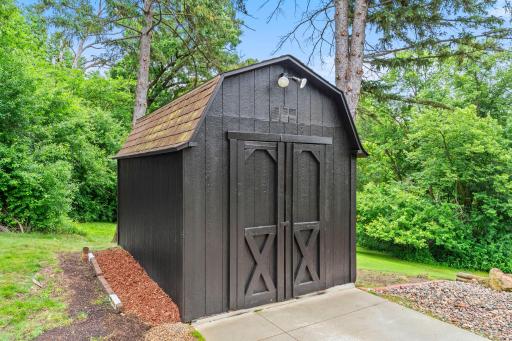 An additional backyard storage shed, providing even more room for tools, equipment, and seasonal storage.