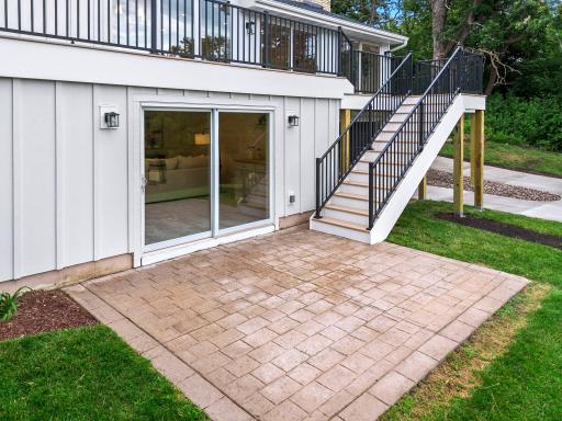 Paver patio for added gathering space.