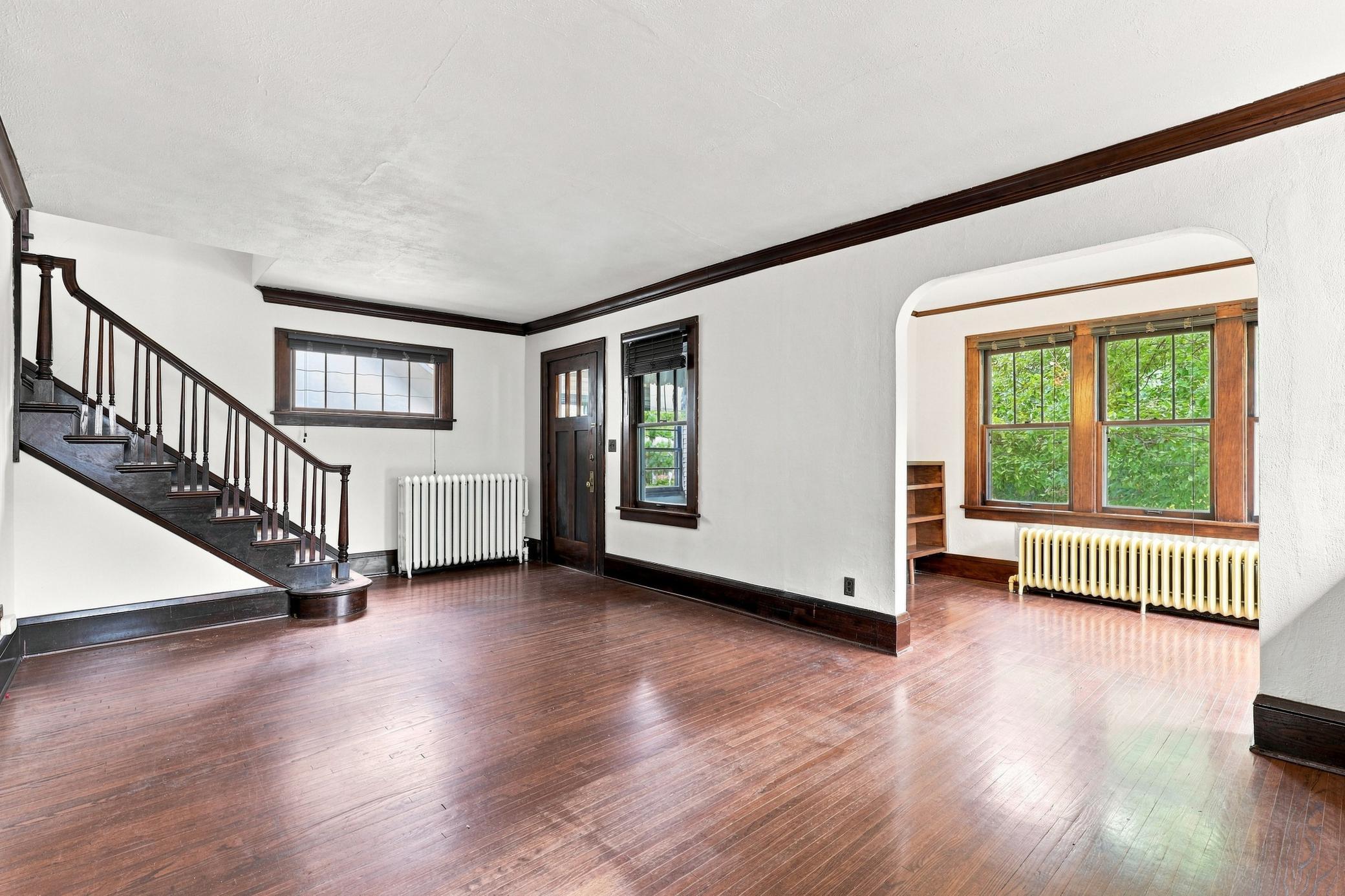 Open floor plan with archways