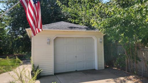 New vinyl siding on garage.