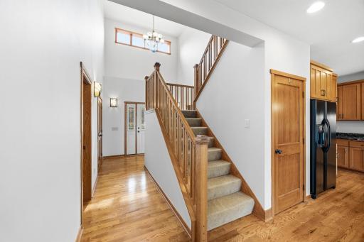 Upstairs leads to two bedrooms, a full bath and your laundry.