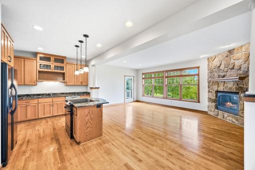 Beautiful open concept, real wood floors and how about those windows?