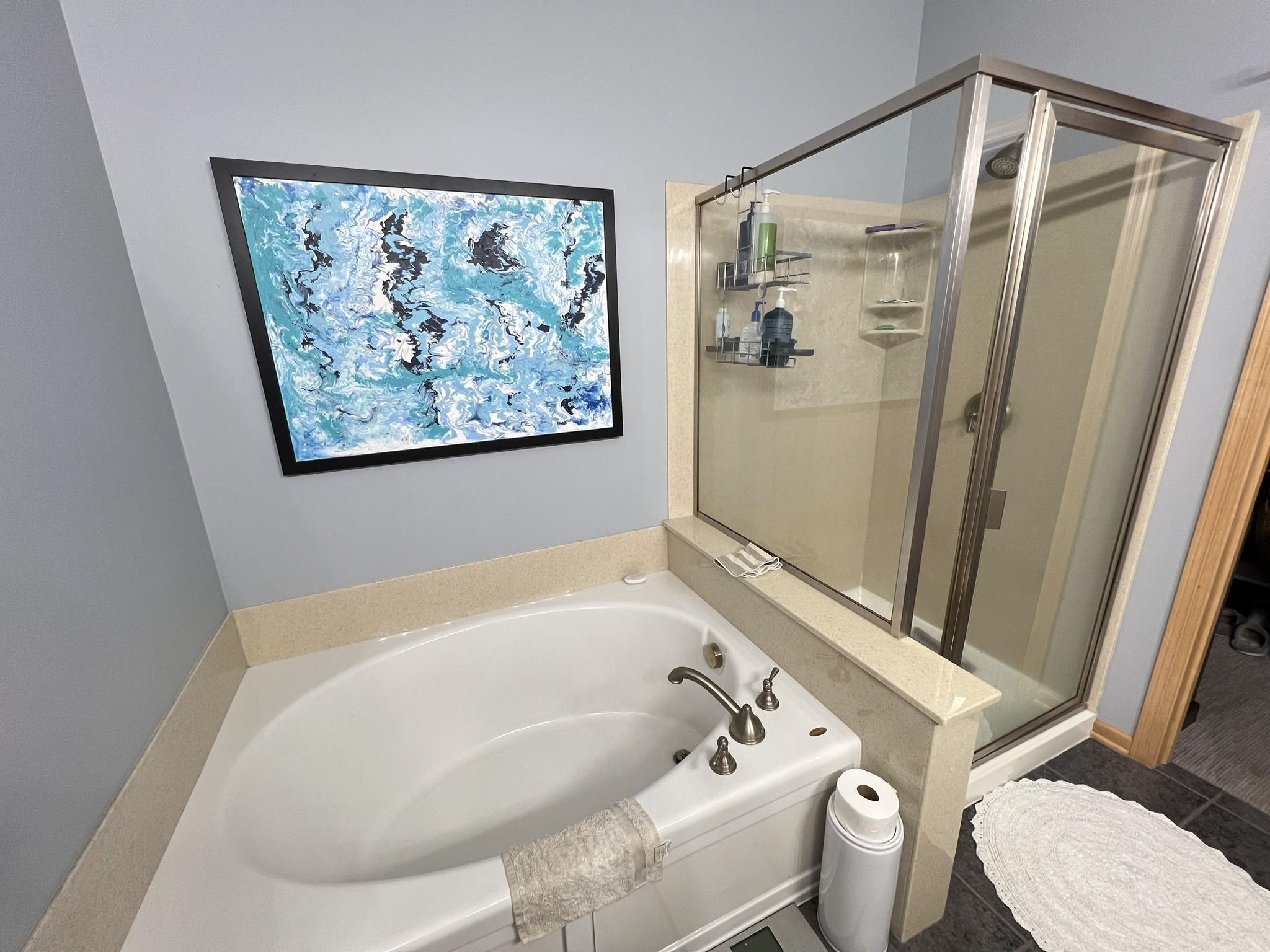 Soaking tub in primary bathroom