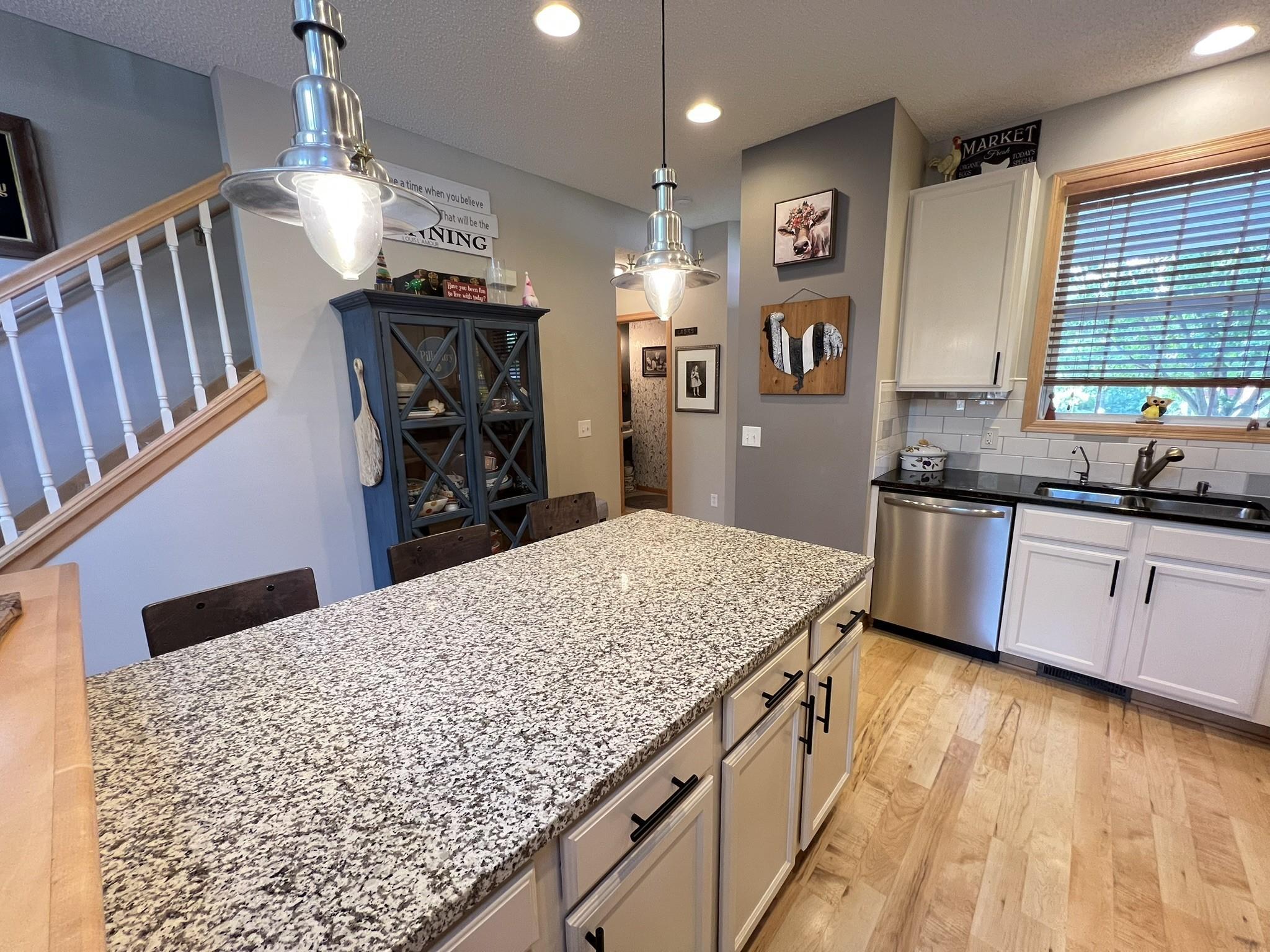 Kitchen also has updated lighting.