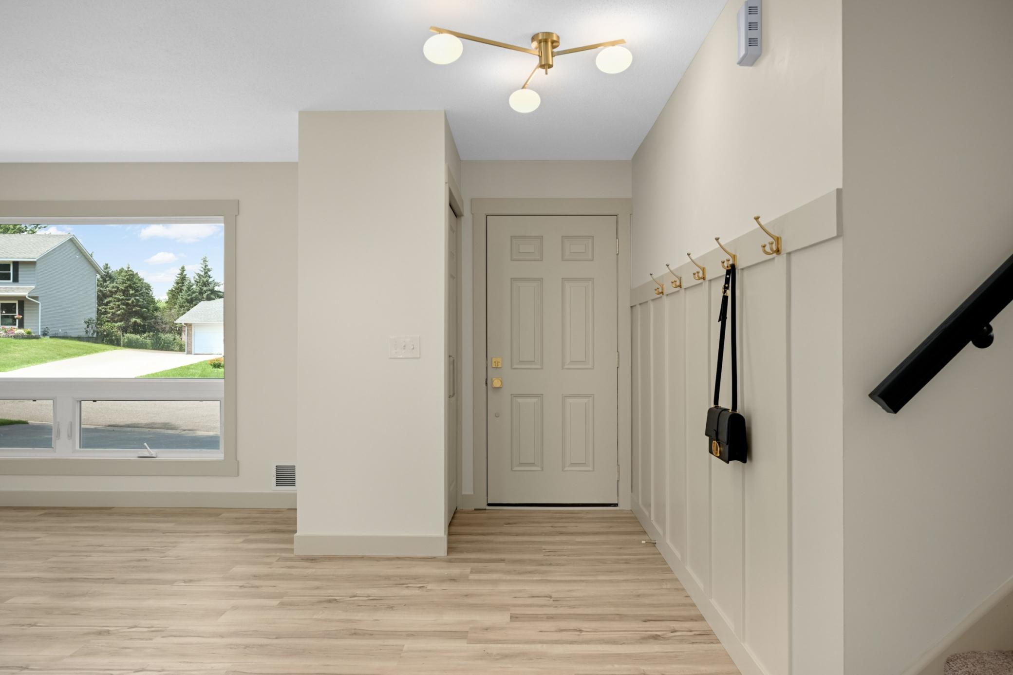Inviting entry with custom built wall hooks!