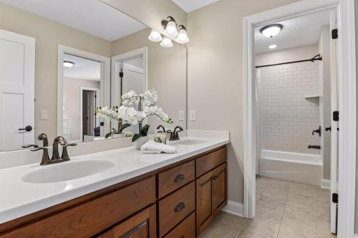 Full Jack and Jill bathroom connects directly to bedrooms #3 and #4.