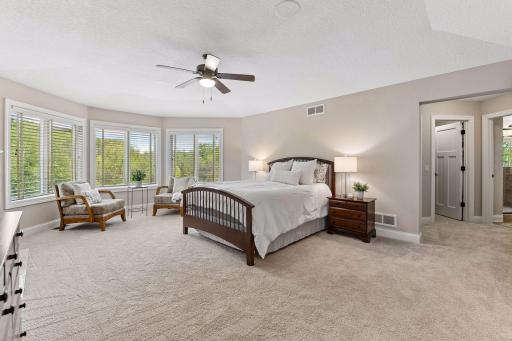 Set apart on its own level, the expansive primary suite features treetop views and a private gas fireplace for a true retreat-like feel.