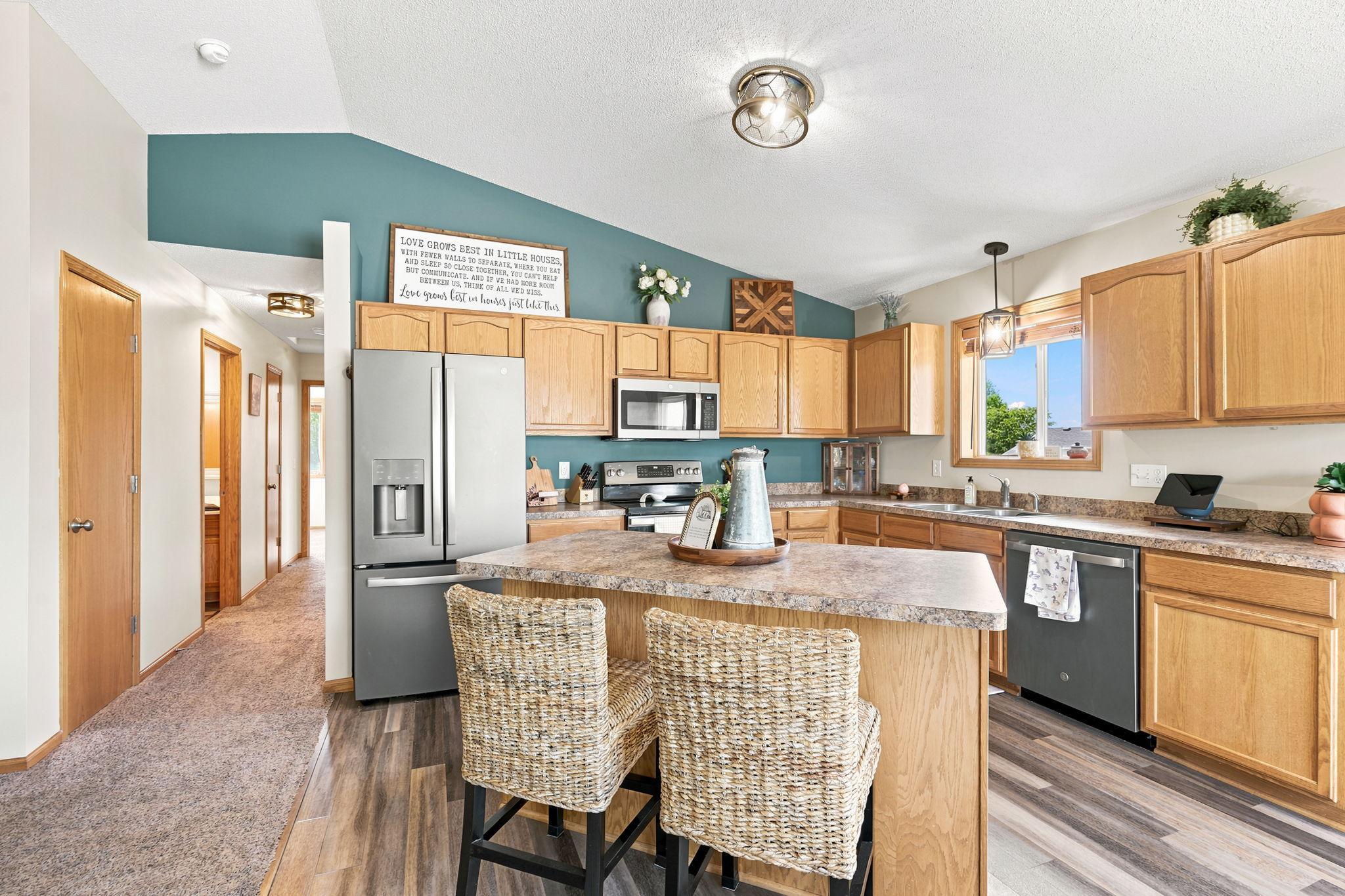 Updated Kitchen Features Granite Countertops and Stainless Steel Appliances