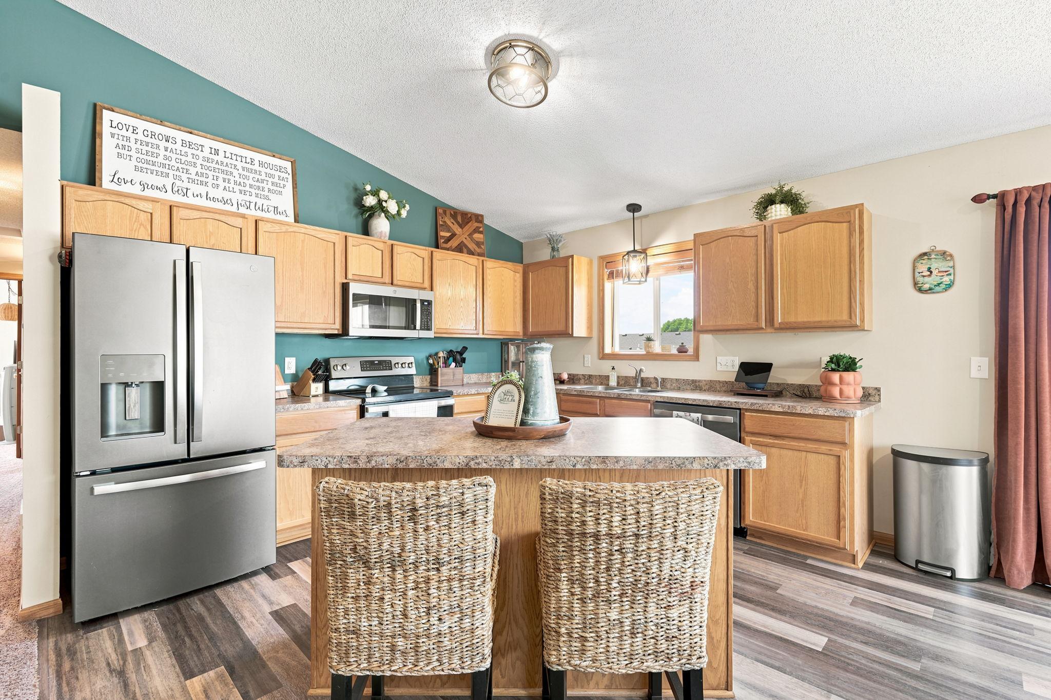 Updated Kitchen Features Granite Countertops and Stainless Steel Appliances