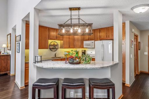 Great kitchen with center island to seat 6 or buffet to use for entertaining. New granite, backsplash and lighting in 2018.