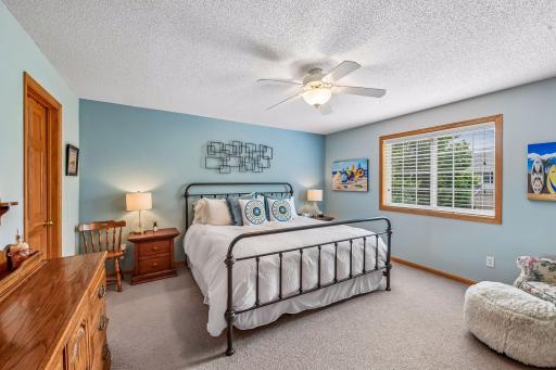 Upper level primary bedroom with generous sized closet
