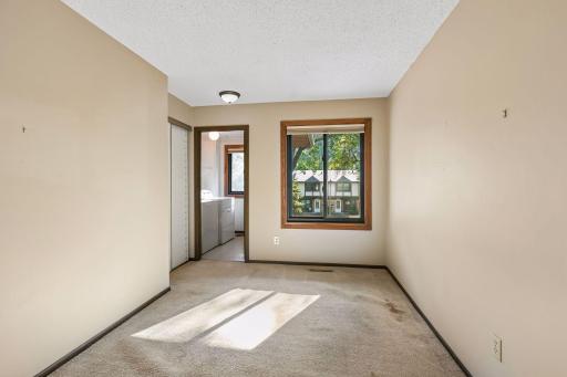 Second Upper Level Bedroom/Den with Convenient Laundry Room
