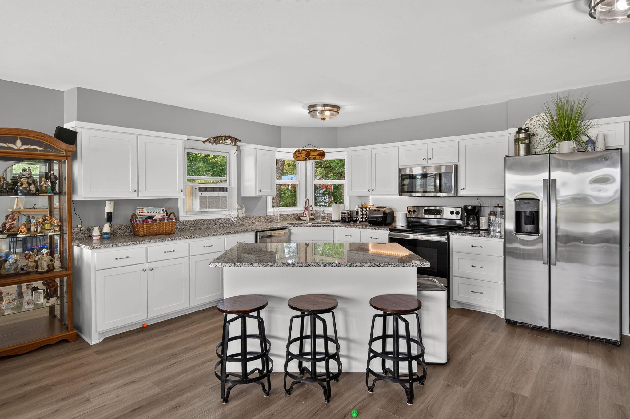 Open Kitchen with solid surface countertops