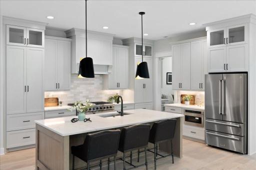 This kitchen is the heart of this home. From the premium Thor appliance package and soft close cabinetry, to the Quartz countertops and tiled backsplash, no detail was overlooked!