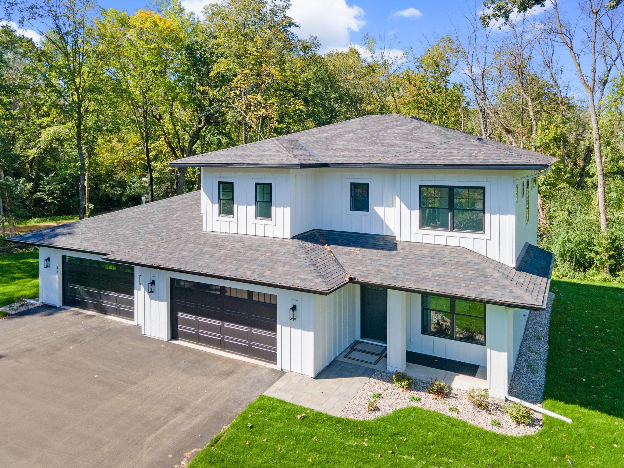 Stunning new construction located minutes from historic downtown Excelsior, this home is sure to impress both inside & out!