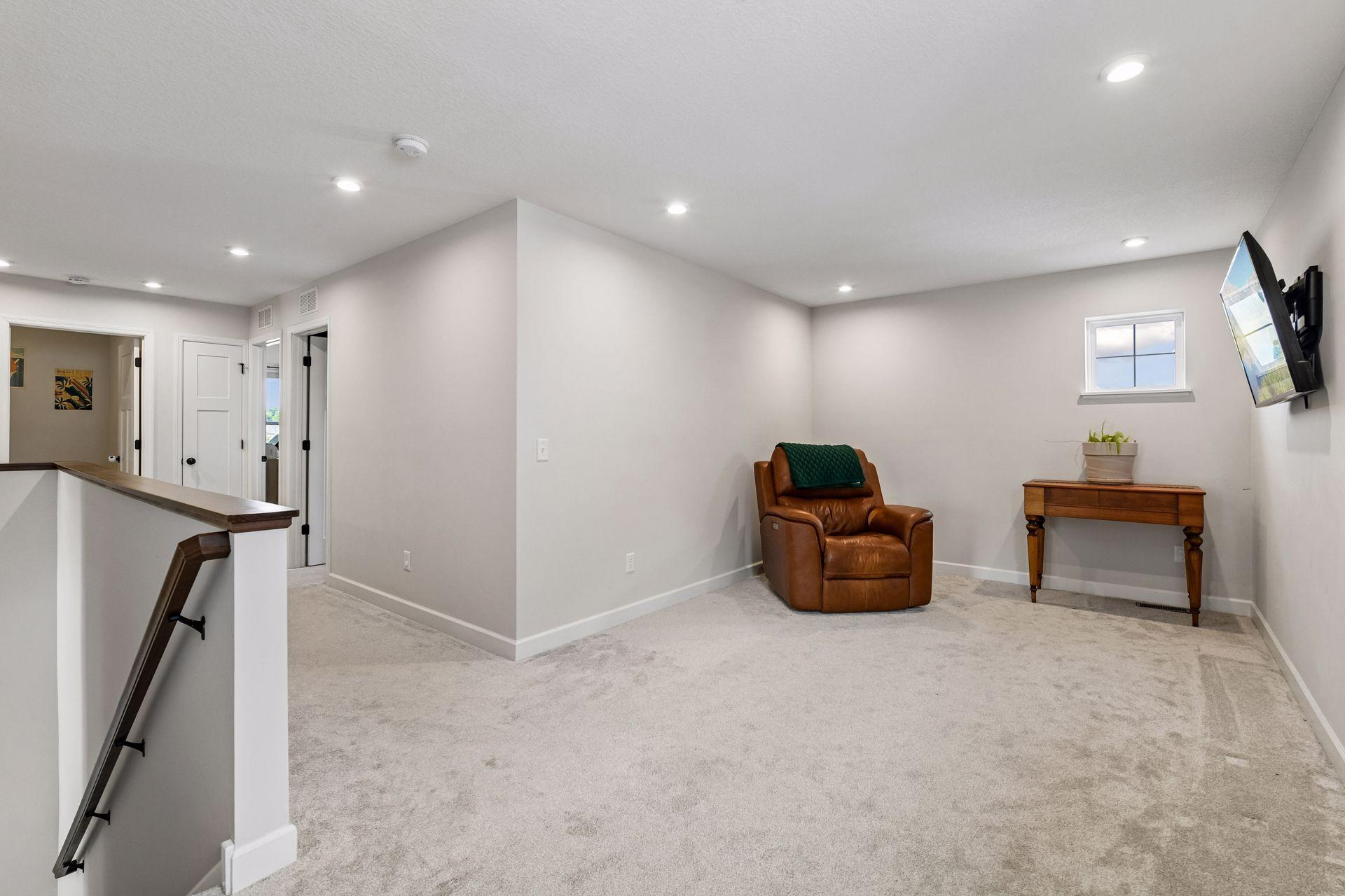As you walk upstairs you are greeted by spacious loft, upstairs laundry and three generous sized bedrooms