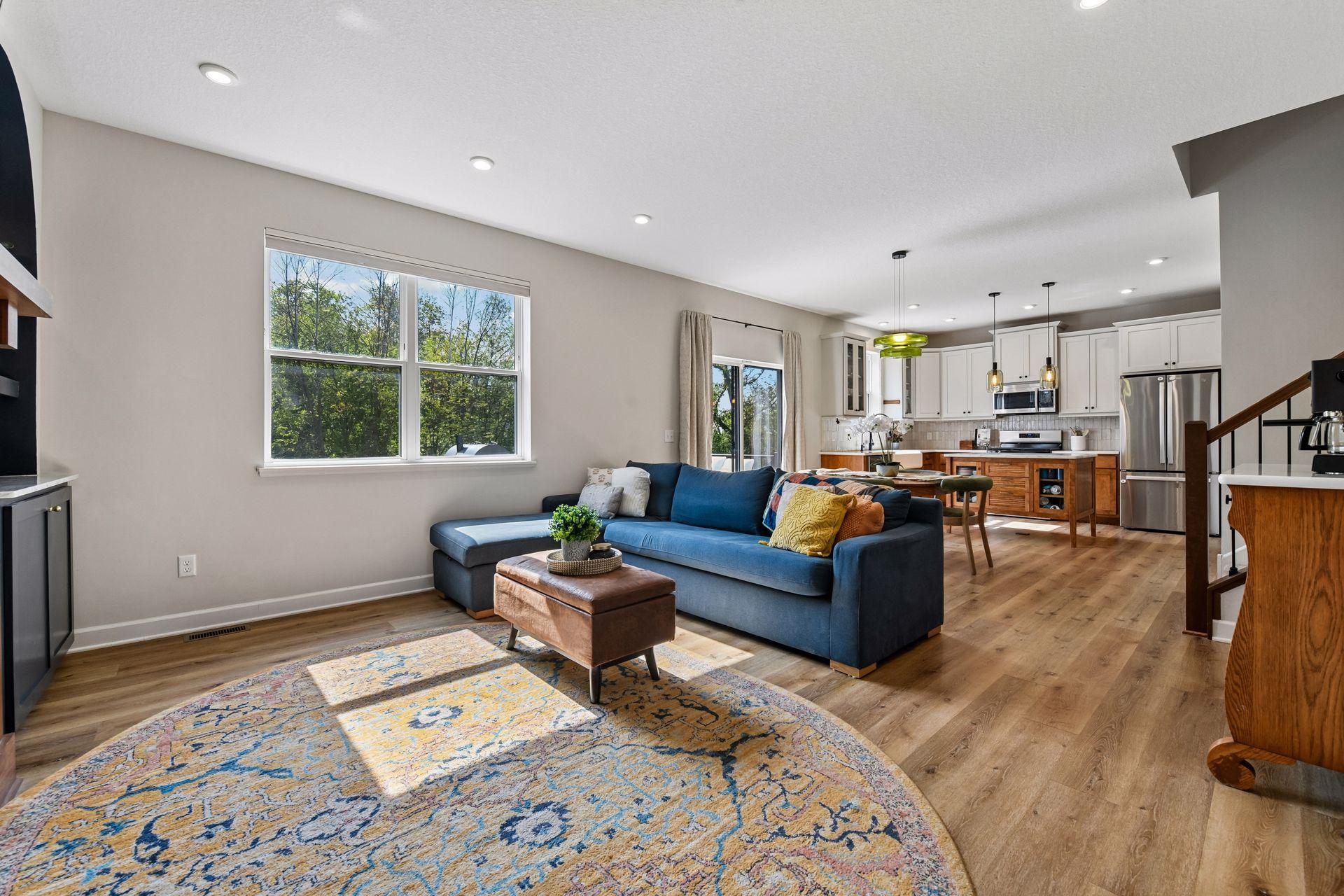 Living room open to kitchen and dining area