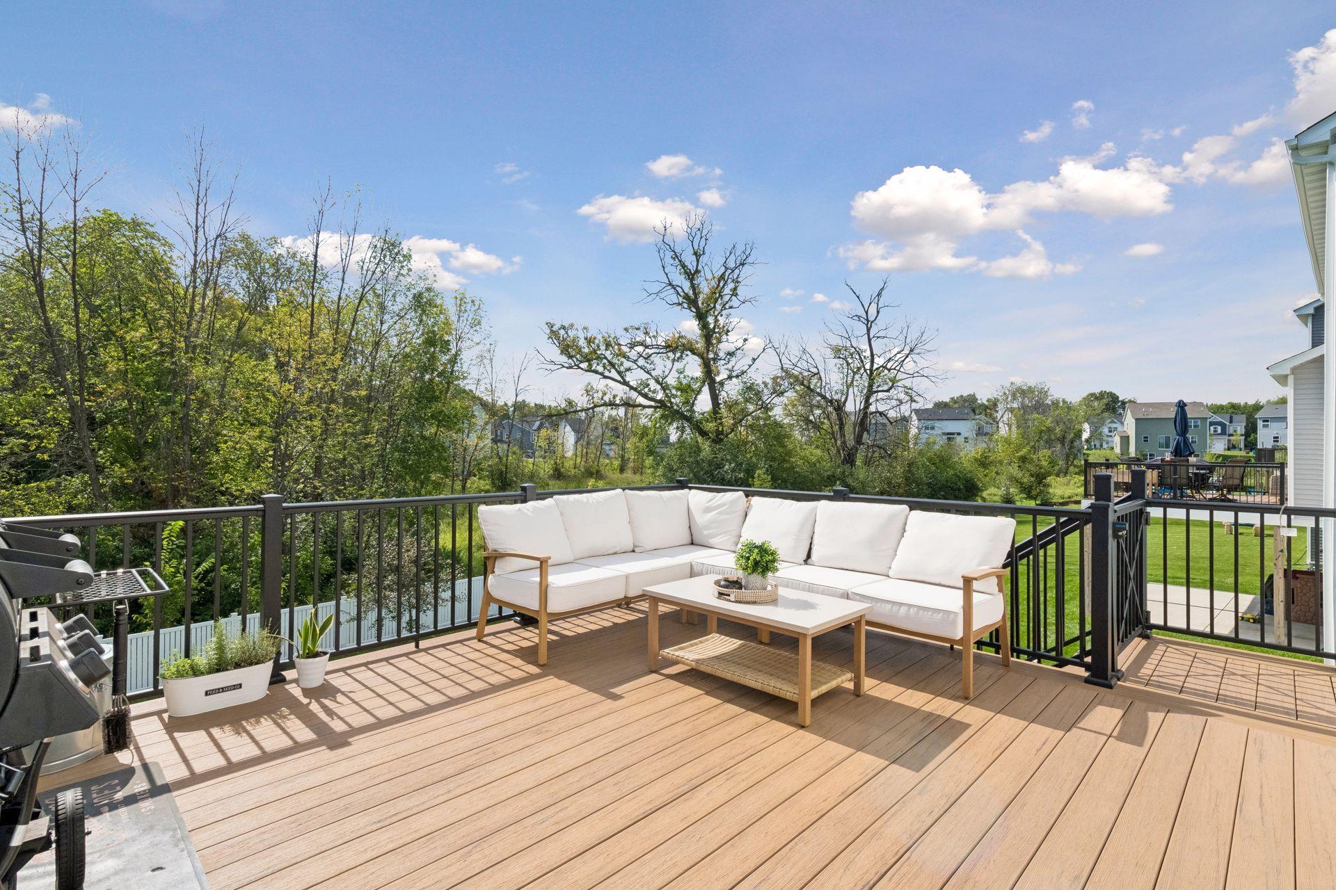 Out back you have composite deck leading to flat fenced backyard