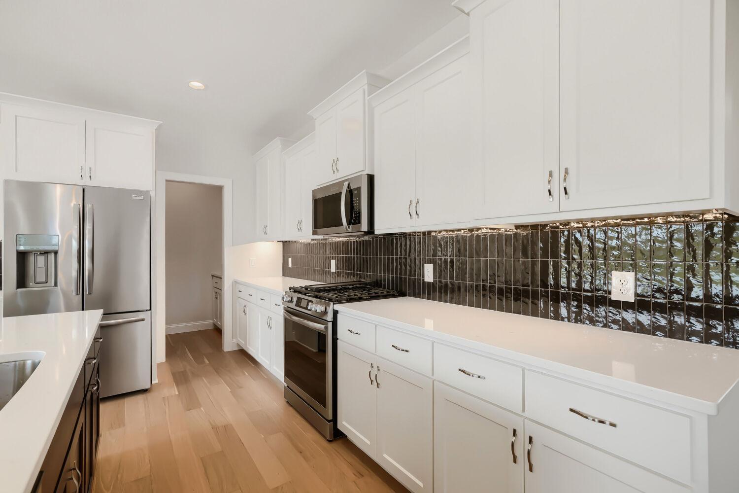 1130 136th St E - Web Quality - 011 - 11 Kitchen.jpg