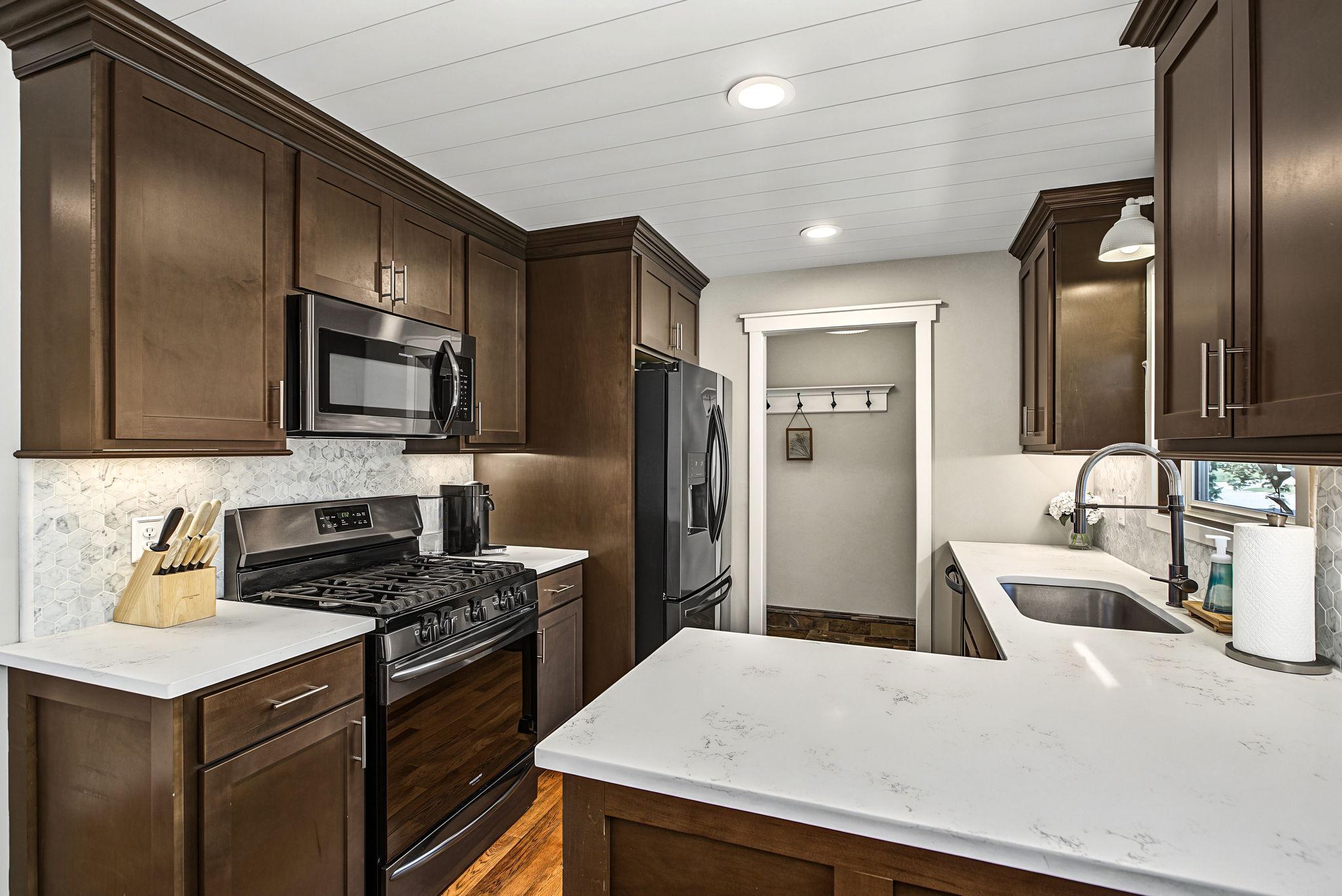 Quartz counter tops, newer cabinets and appliances