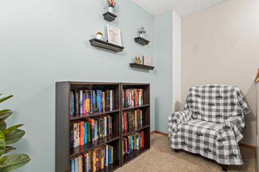 UPPER LEVEL LOFT PERFECT FOR A READING NOOK OR HOME OFFICE.