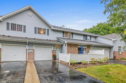 Extra long driveway perfect for guest parking, front patio to relax and grill plus green space to play.