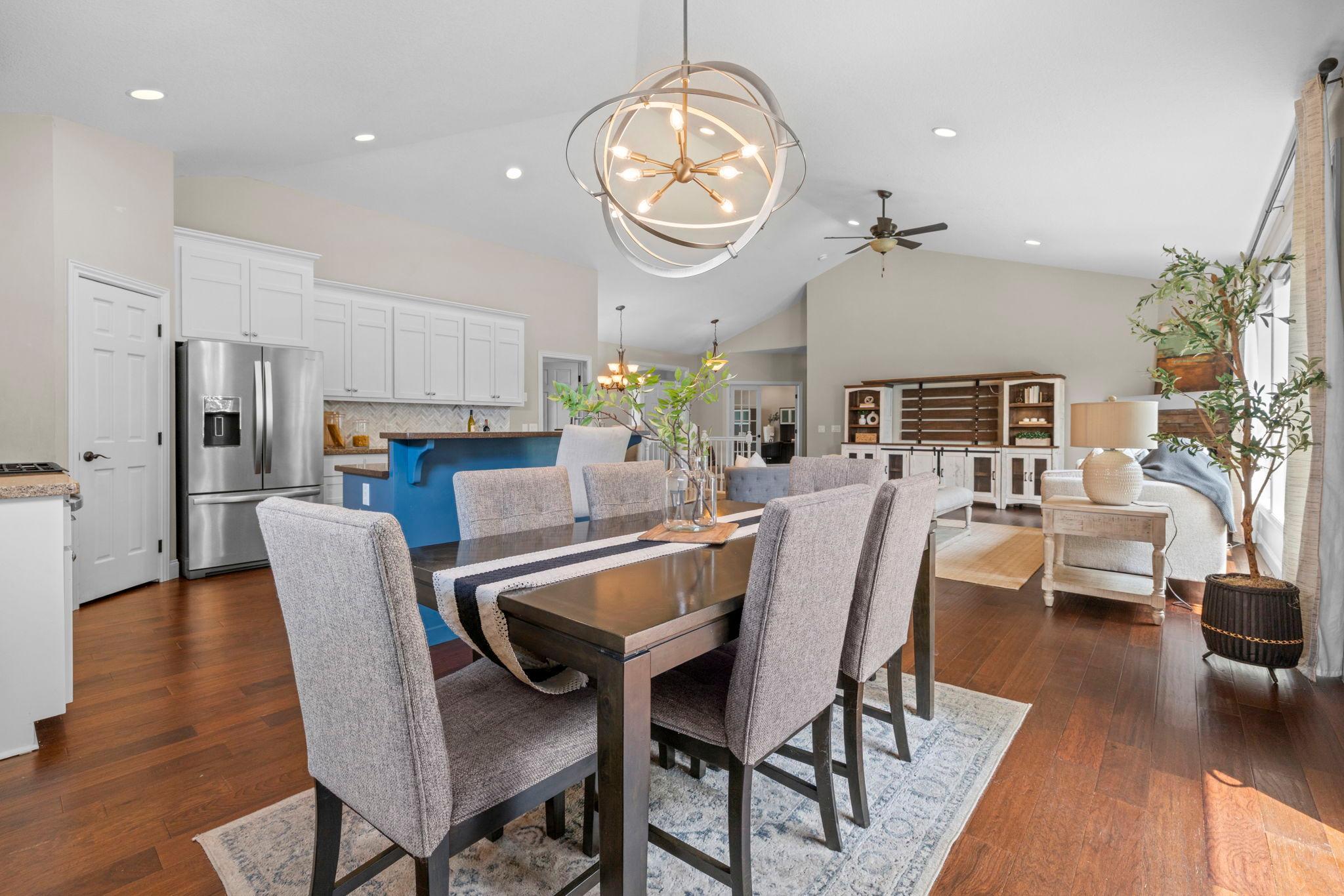 Spacious dining area with direct access to the deck for easy indoor-outdoor living.