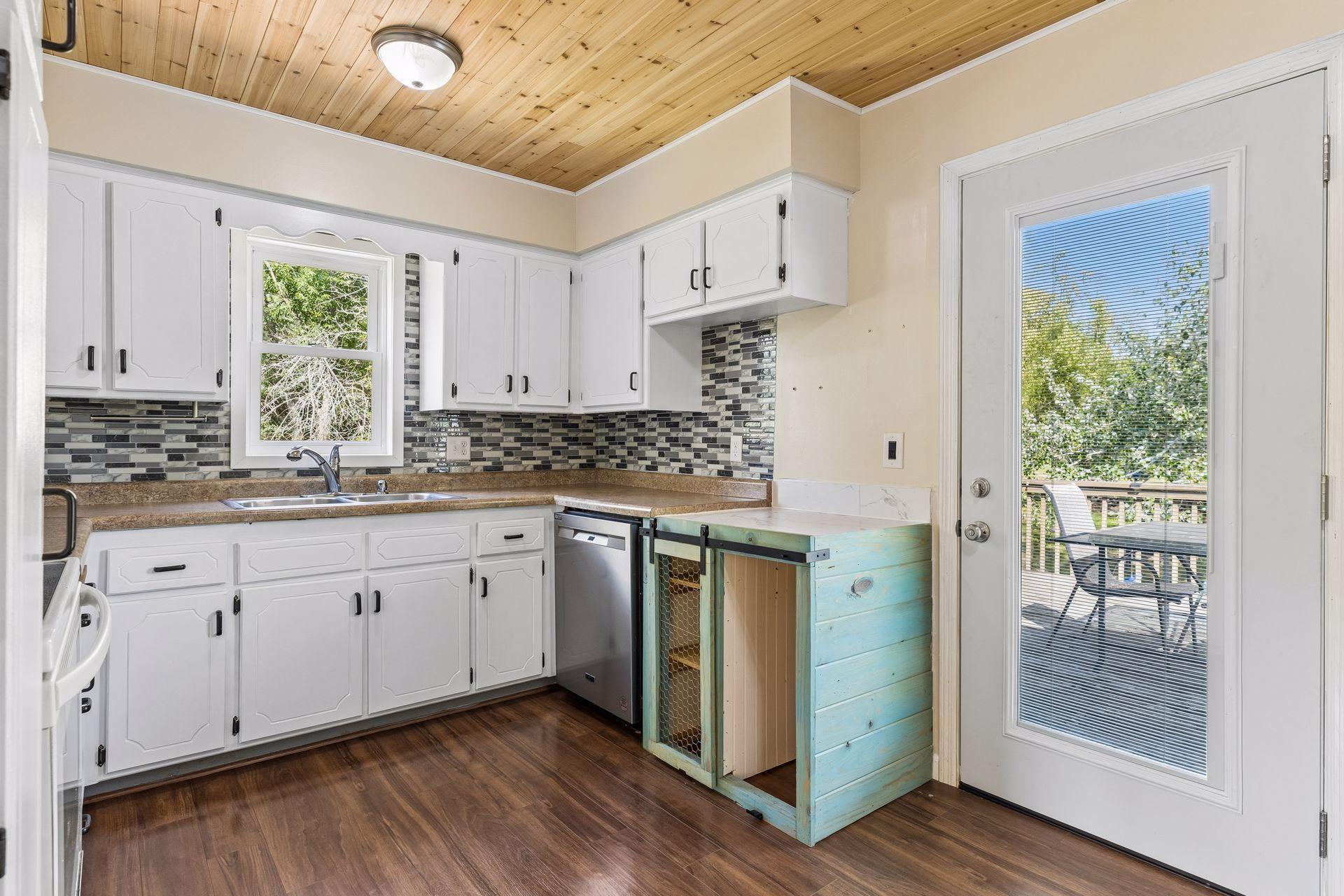 Kitchen door that leads to the deck