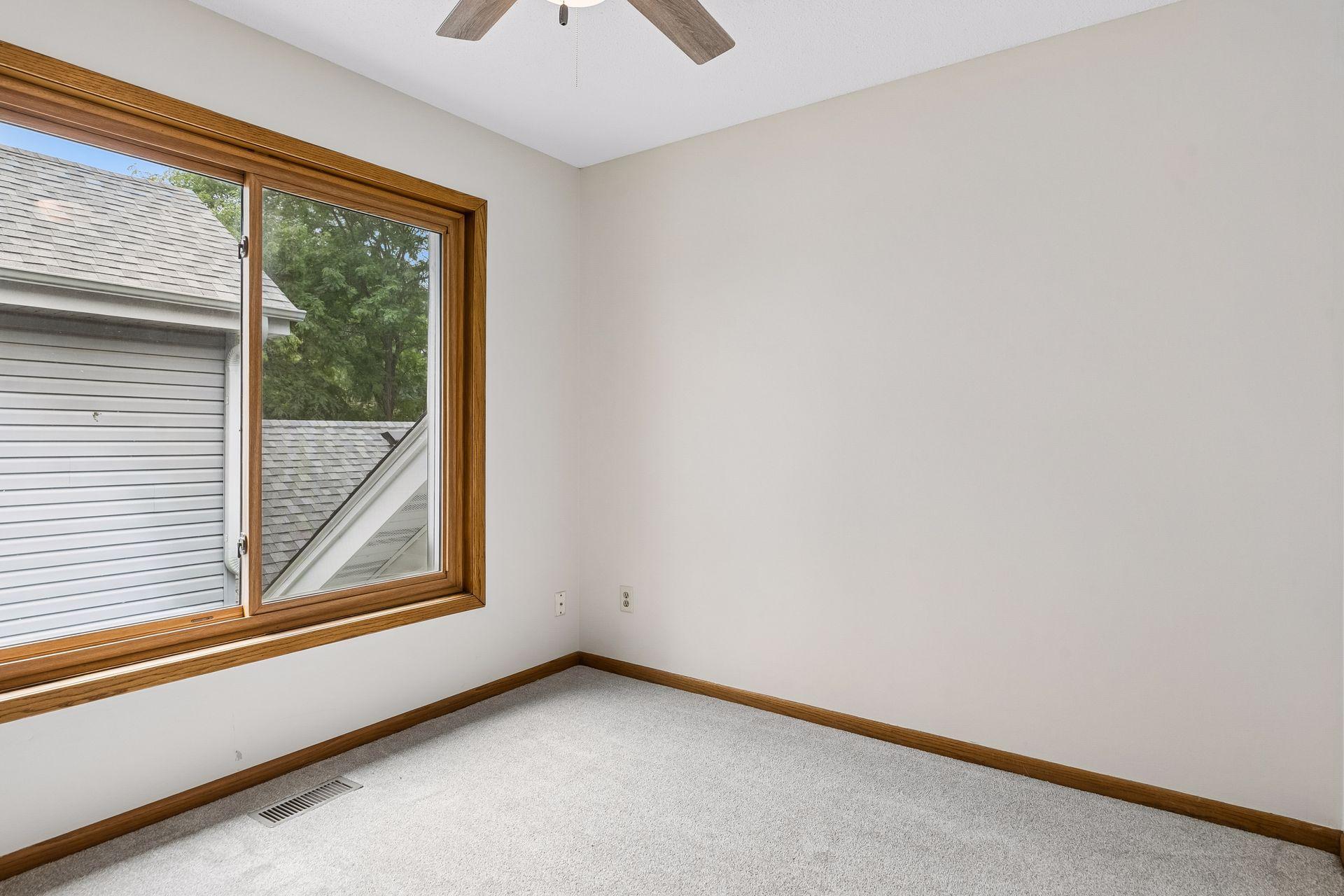 Bedroom 2 with ceiling fan.