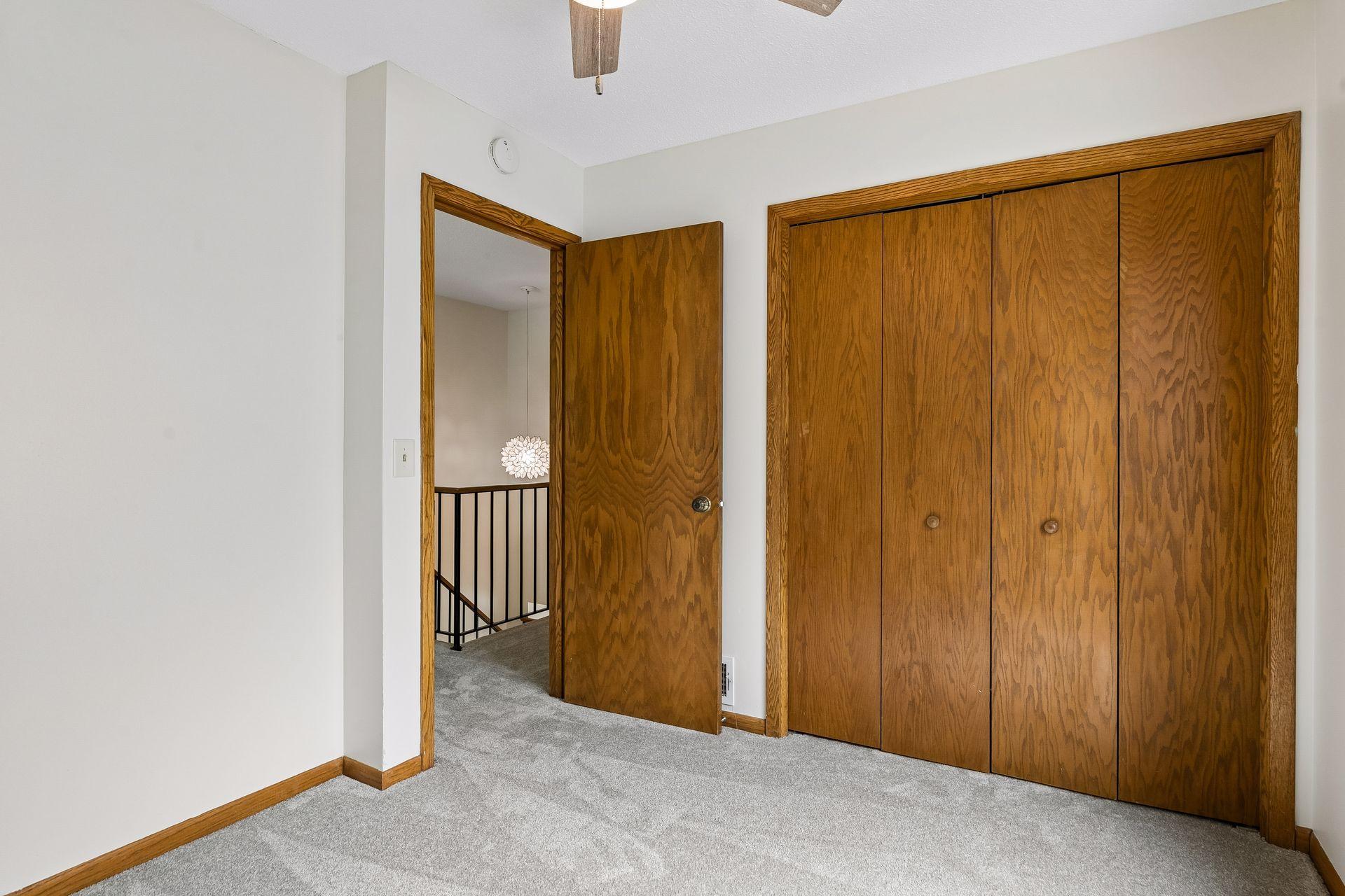 Another look at the second bedroom, also featuring a large closet.