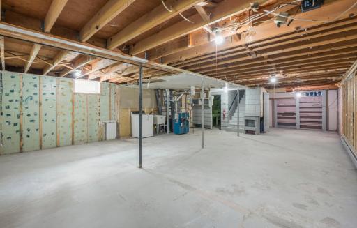 A wide-open unfinished basement provides plenty of room for storage today and possibilities for future use.