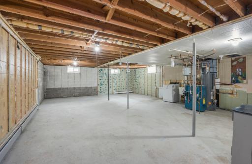Another view shows just how much open space the basement offers, along with easy access to the home’s mechanicals.