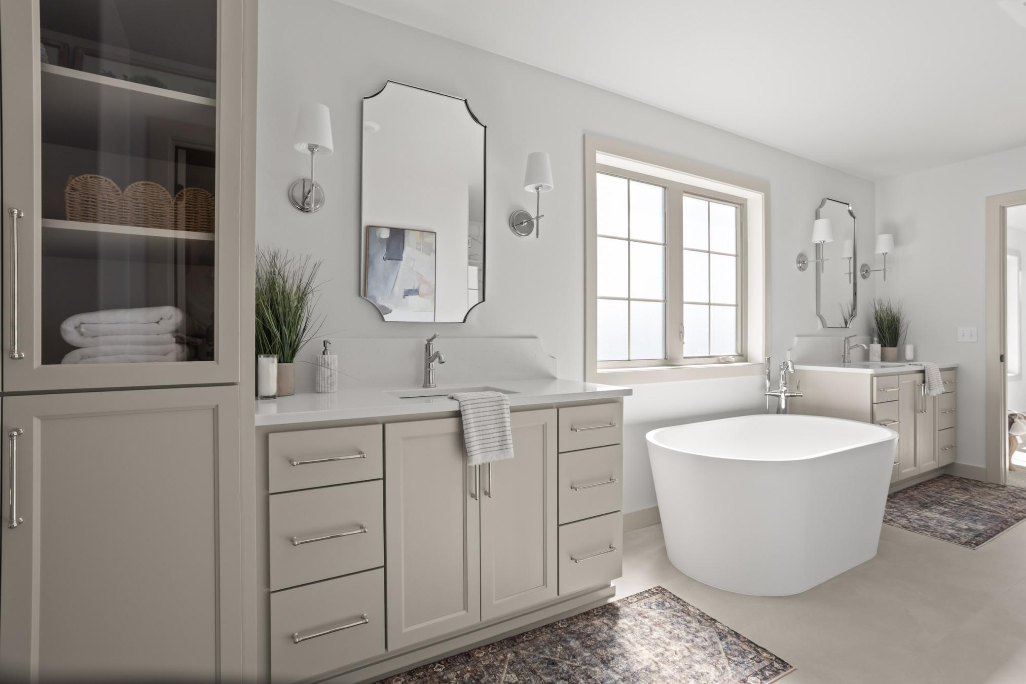 Primary Bathroom Soaker Tub, Custom Cabinets, Full Height Quartz Backsplash.jpg