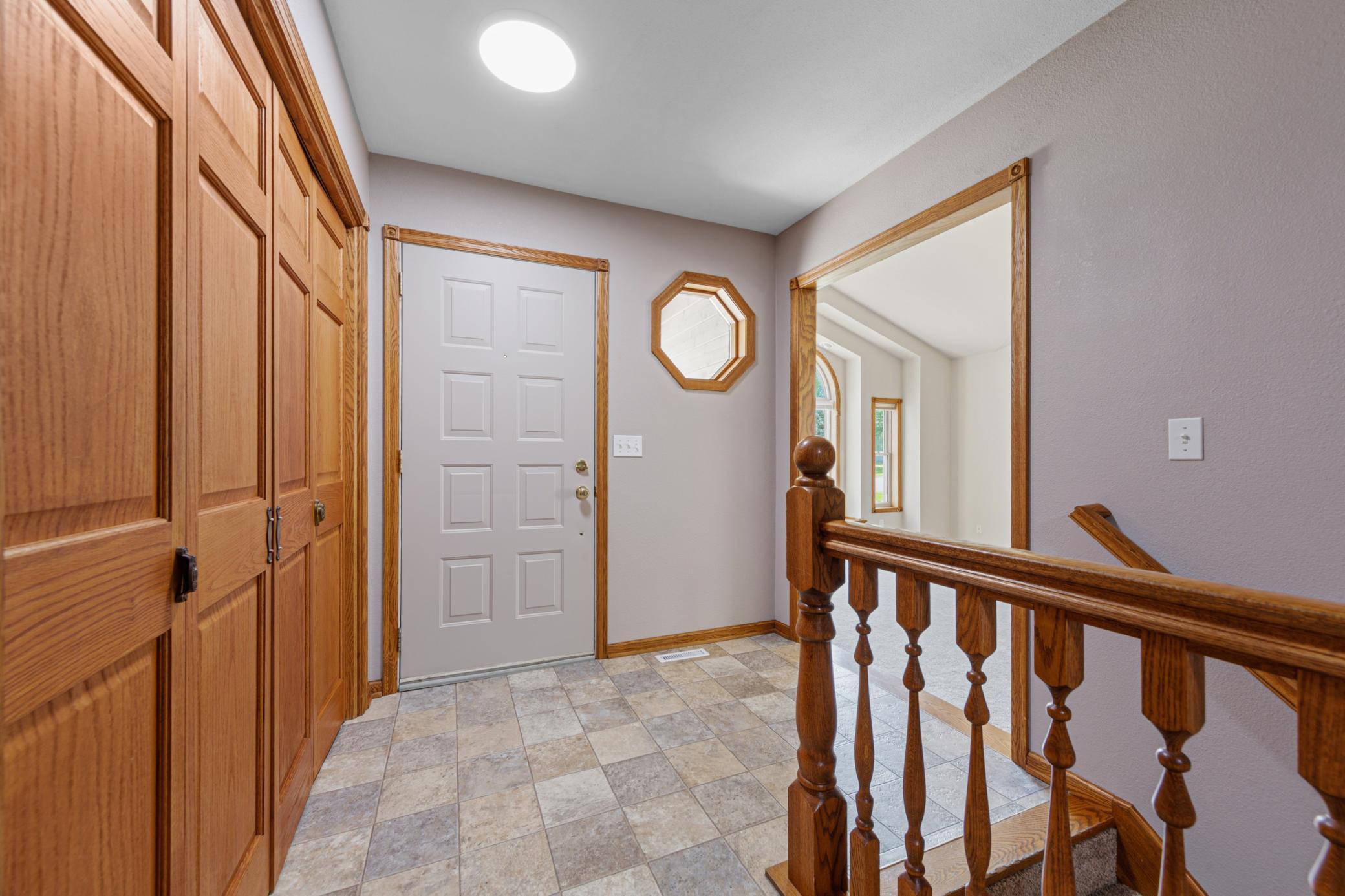Spacious front entry with closet