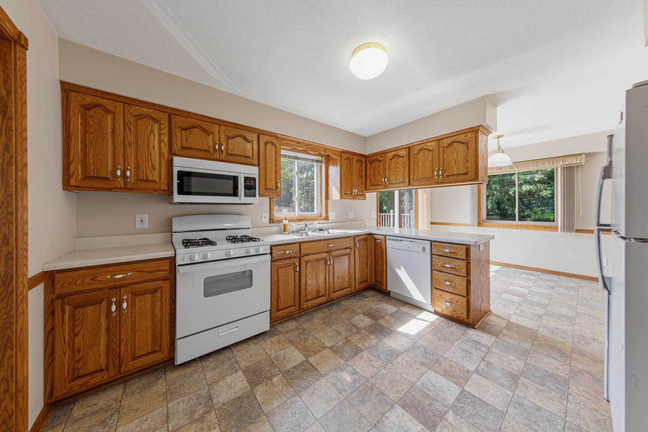 Solid, raised panel oak cabinetry