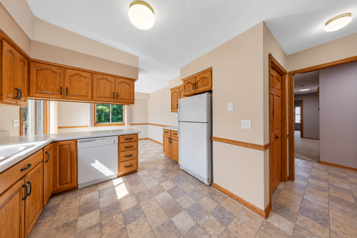 Kitchen with pantry and easy access to the informal and formal dining rooms