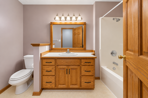 Full guest bath with new handles on main level.