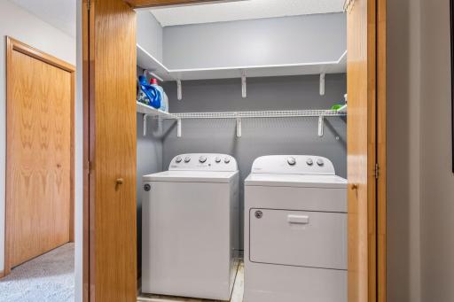 Convenient Laundry room closet on 2nd floor with plenty of shelving