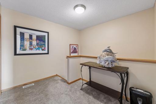 Comfortable loft area perfect for home office or a great space to sit, read, or play video games