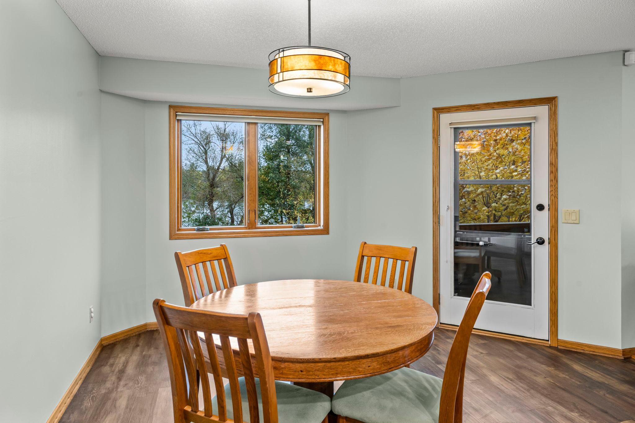 It flows seamlessly into the informal dining area, creating a connected and inviting layout.