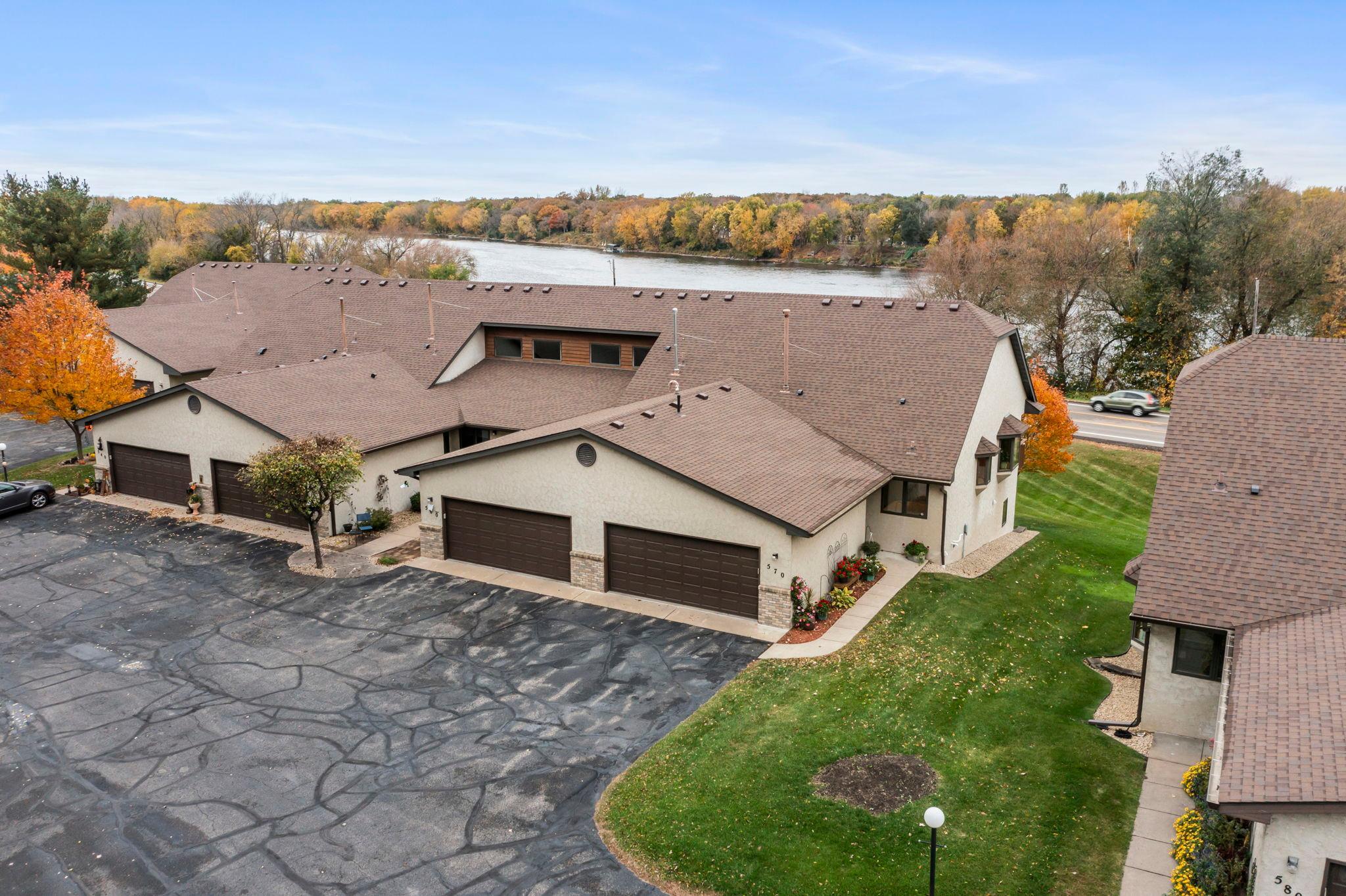 Perched in an exceptional setting with beautiful Mississippi River views, this 2-bedroom, 3-bath home offers a rare blend of privacy, natural beauty, and convenience.