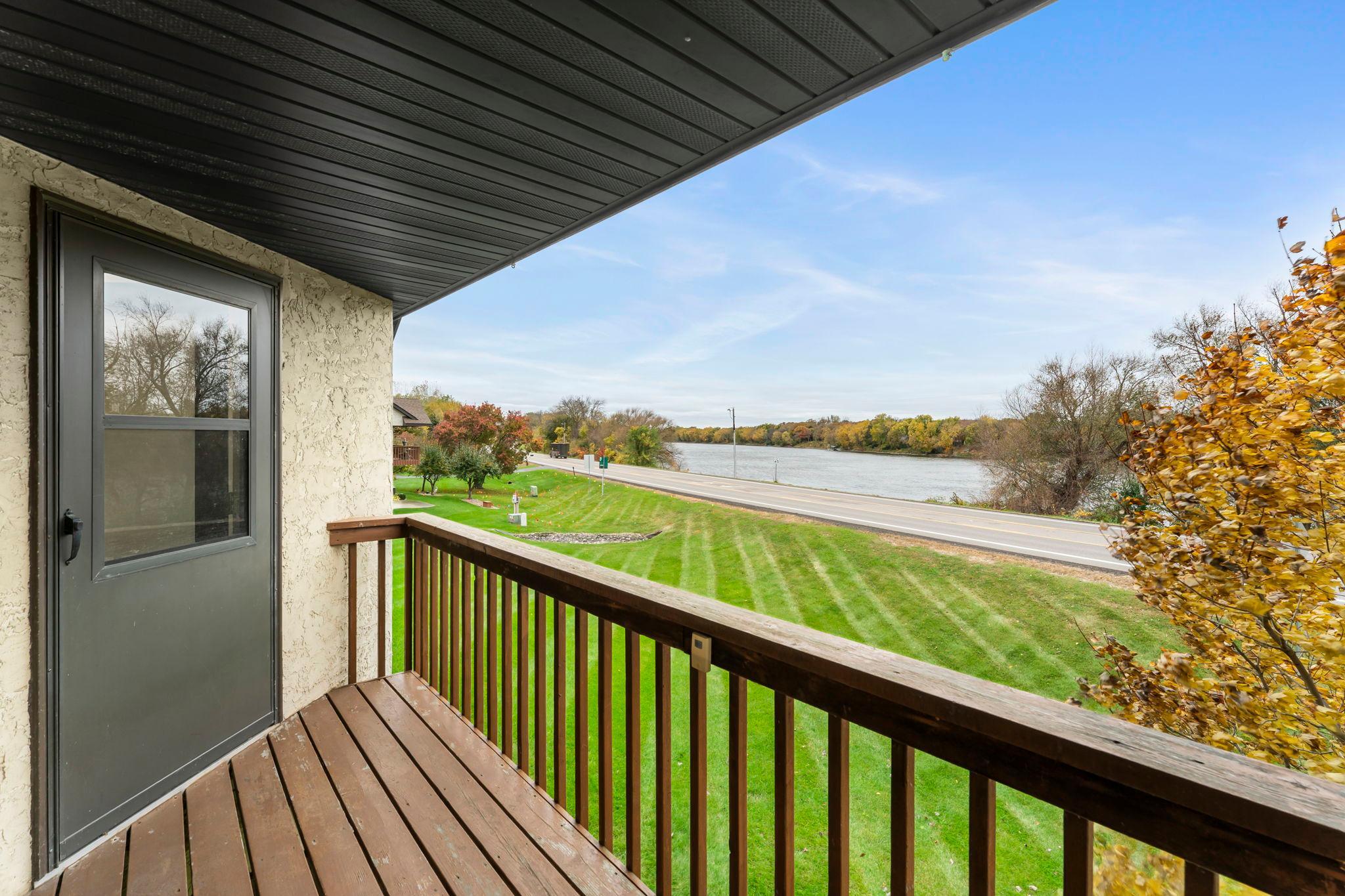 Sweeping views of mature trees, greenspace, and the Mississippi River, an ideal setting to relax or entertain.