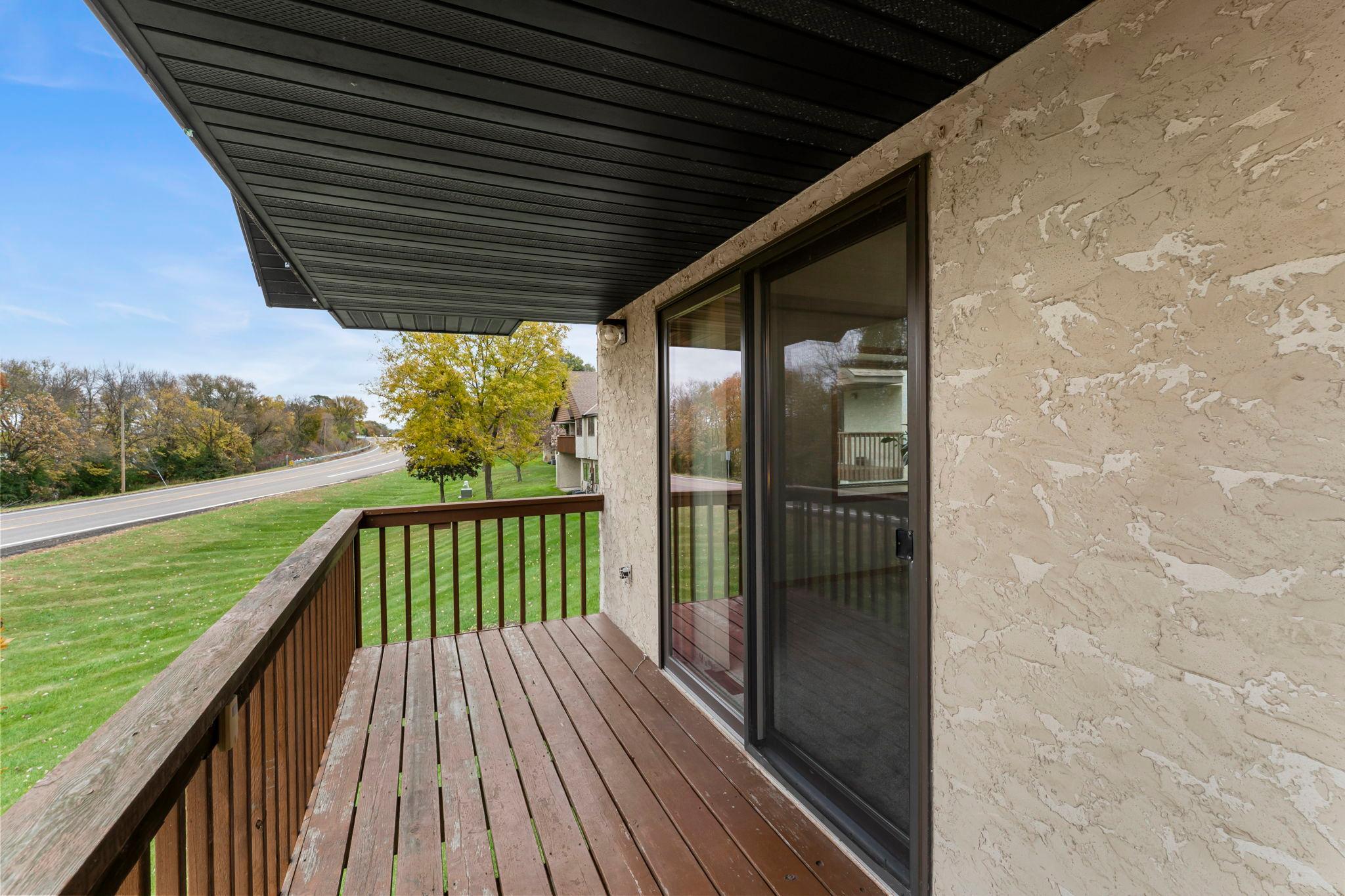 From here, two sets of glass doors lead to a spacious deck.