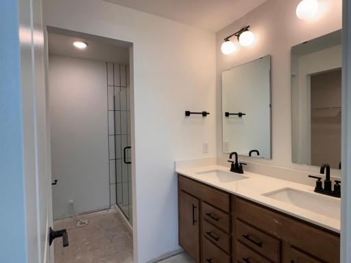 En Suite Bath- Tiled Shower/ Frameless Glass Door