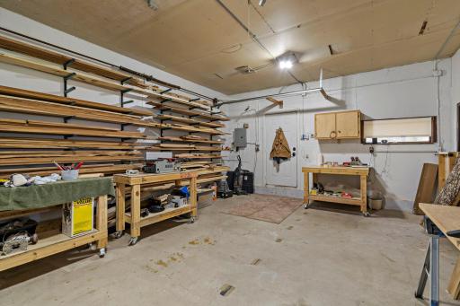 There are two additional sectioned-off spaces in the workshop that offers even more flexibility for dedicated storage, specialized work areas, or keeping tools and supplies neatly separated from the main workshop.