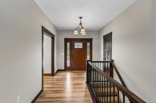 The knotty alder trim throughout the upper level is stunning