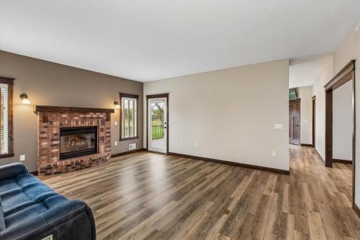 Living room with access door to deck