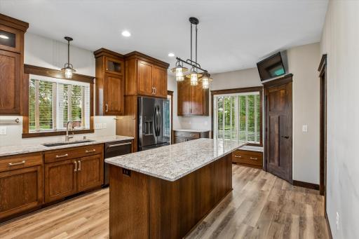 Beautifully updated kitchen with plenty of cabinets and storage