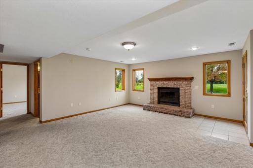 Wood-burning fireplace in lower level