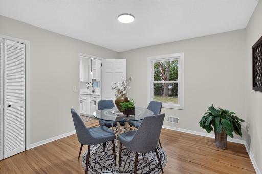 Main level: dining room (bedroom 1 staged as dining room)